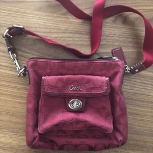Burgundy Coach crossbody bag